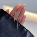 Boucles d'oreilles à chaînette avec étoile, accessoire féminin