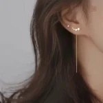 Boucles d'oreilles pendantes étoilées pour femme