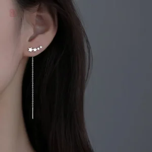 Boucles d'oreilles fantaisie avec design étoilé élégant