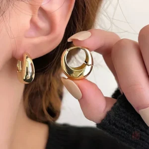 Boucles d'oreilles fantaisie en style épais et rond