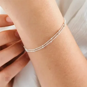 Bracelet double chaînes avec petites boules pour femmes tendance