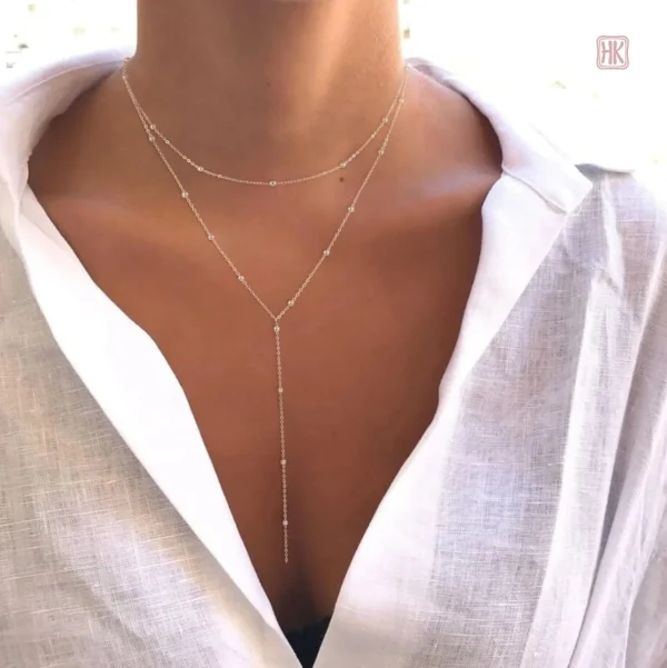collier-a-double-rang-en-y-a-petites-perles-1 Collier en Y à double rang avec petites perles tendance femme