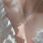 Collier double chaînes avec motif en cœur pour femme tendance
