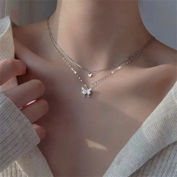 collier-double-rang-papillon-1 Collier Papillon Double Rang pour Femme Tendance