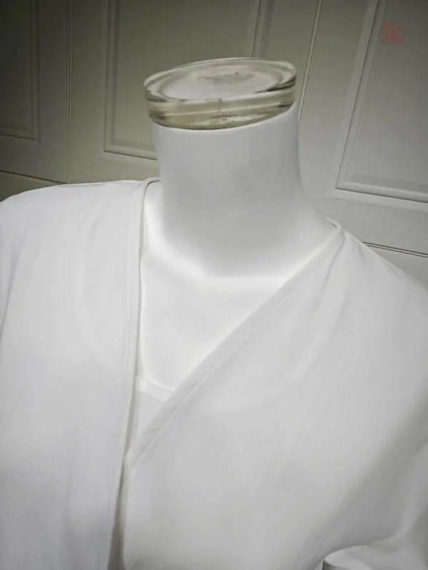 Abaya ample avec motifs floraux
