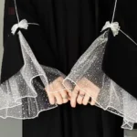 Abaya féminine avec finitions en dentelles raffinées