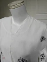 Style contemporain avec symbole du Mauvais Œil