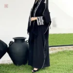 Vêtement féminin chic en abaya