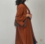 Abaya longue orange avec dos à lacet