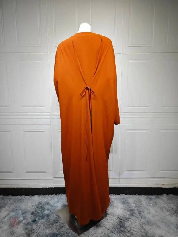 Abaya en orange avec design lacé