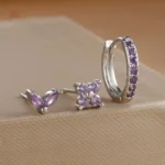 Boucles d'oreilles argentées avec détails en zircon