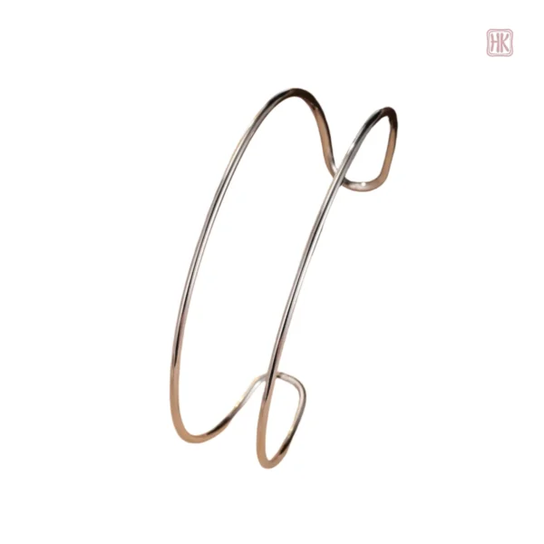 Accessoire de mode : manchette élégante à double anneau pour femme