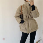 Manteau femme chic en beige, coupe courte