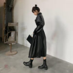 Manteau noir en cuir pour un look élégant