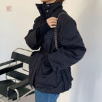 Manteau noir femme, coupe élégante et moderne