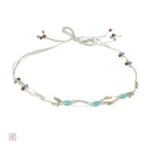 Ceinture design ornée de perles pour un look élégant