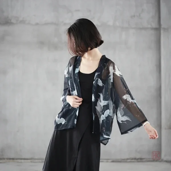 Veste légère en tissu transparent avec motifs de grues